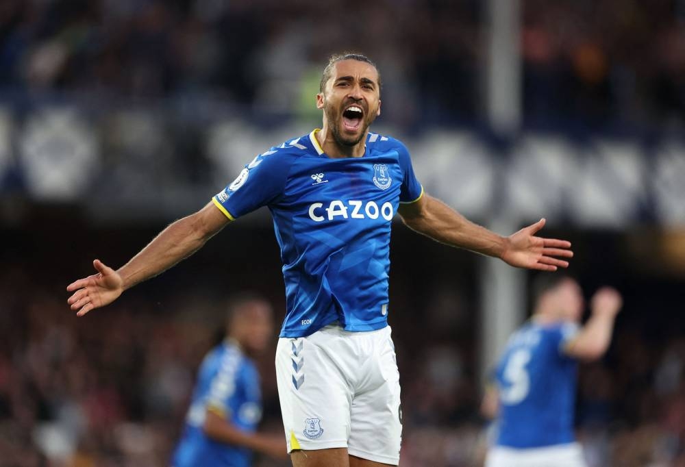 Everton's Dominic Calvert-Lewin celebrates after Michael Keane scored their first goal against Crystal Palace at  Goodison Park, Liverpool May 19, 2022. — Reuters pic