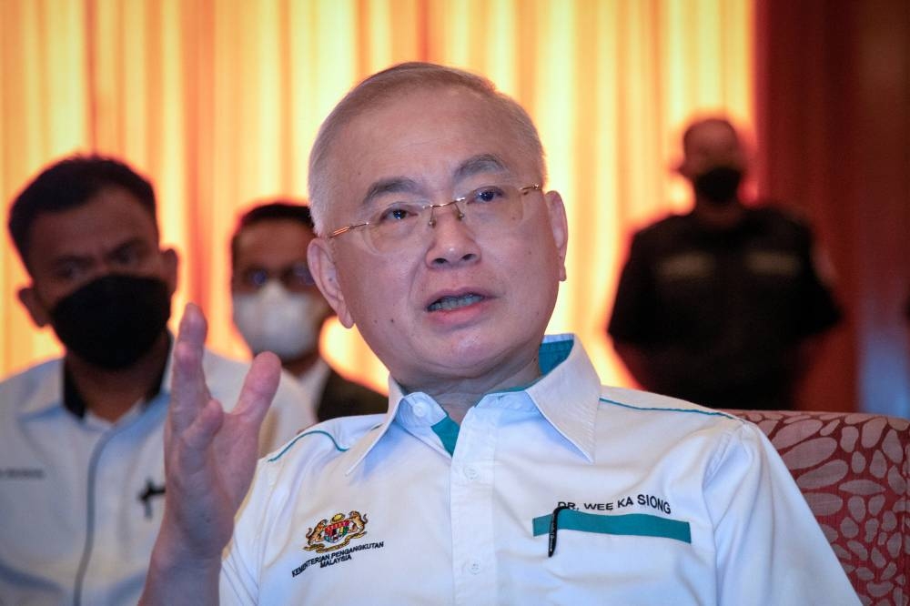 Transport Minister Datuk Seri Wee Ka Siong during a press conference after witnessing The Heads Of Agreement Signing Ceremony between Victoria STS Labuan Sdn Bhd and Fendercare Marine Asia Pacific in Labuan May 20, 2022. — Bernama pic