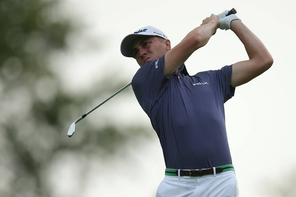 Justin Thomas mixed four birdies, including one at his final hole, with a single bogey to return a second consecutive three-under 67 to sit on six-under at the midway point bumping the Northern Irishman from top spot. ― Picture by  Brad Penner-USA TODAY Sports via Reuters