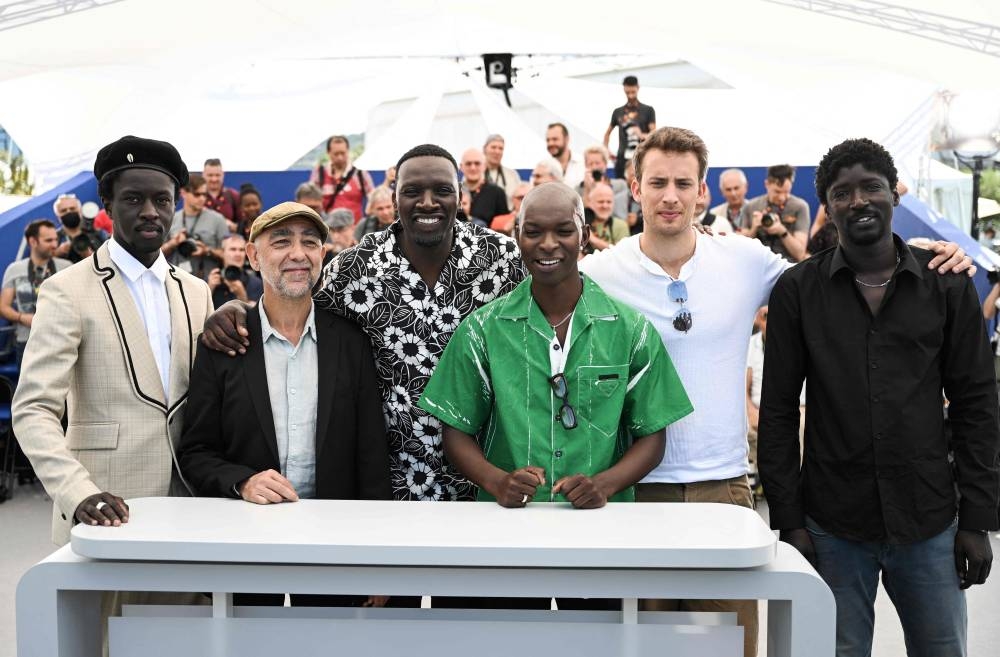 Actor Bamar Kane, French director Mathieu Vadepied, French actor and comedian Omar Sy, actor Alassane Diong, French actor Jonas Bloquet and actor Alassane Sy pose during a photocall for the film ‘Father And Soldier (Tirailleurs)’ in Cannes May 19, 2022. — AFP pic