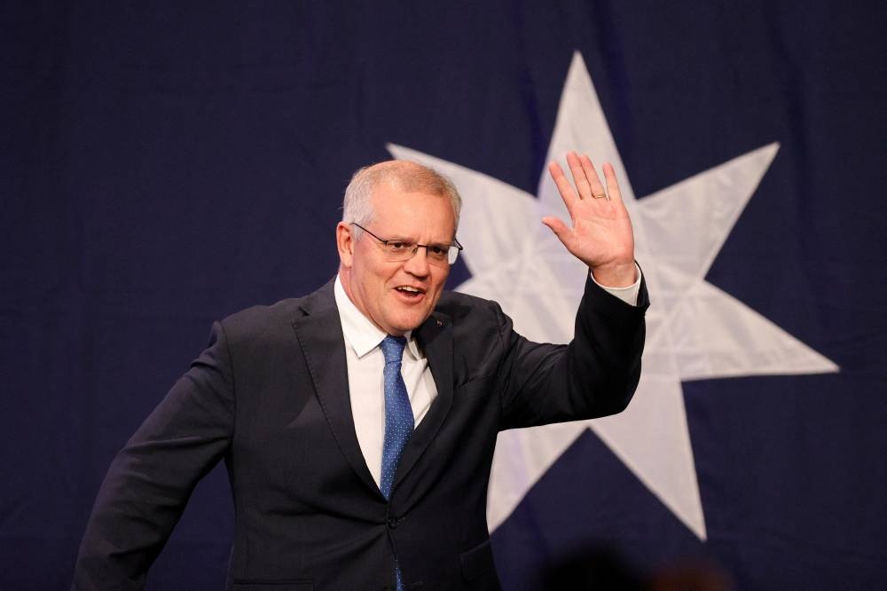 Incumbent Prime Minister Scott Morrison, leader of the Australian Liberal Party, arrives to address supporters on the outcome of the country's general election in which he ran against Labour Party leader and expected next prime minister Anthony Albanese, in Sydney, Australia, May 21, 2022. ― Reuters pic