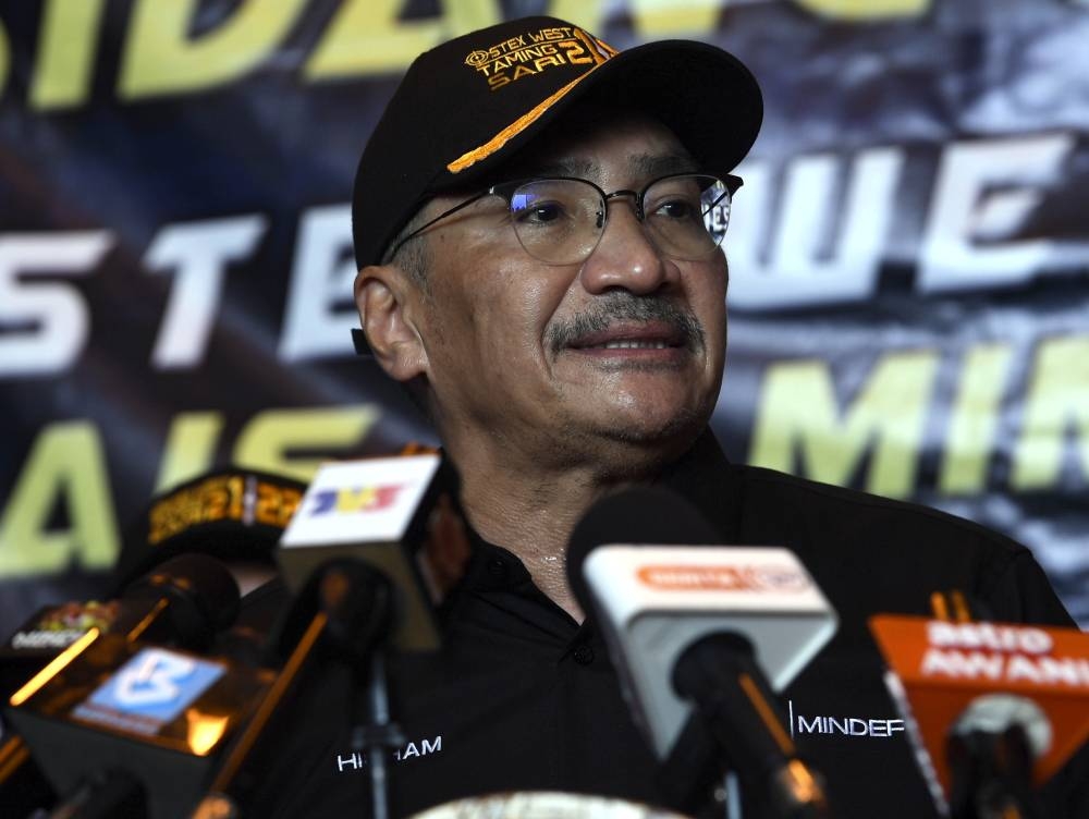 Senior Defence Minister Datuk Seri Hishammuddin Hussein speaks at a press conference after witnessing the 2022 Taming Sari Exercise Series 21 in the waters at the north of the Straits of Melaka near Langkawi May 22, 2022. — Bernama pic