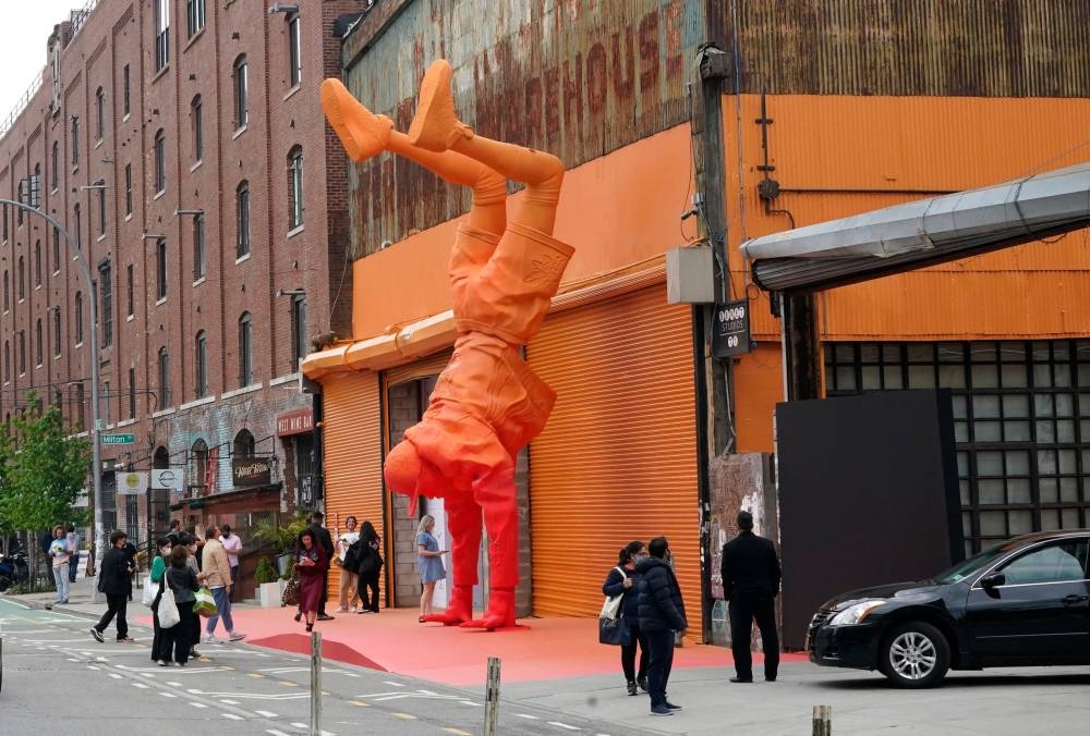 A sculpture of the late Virgil Abloh, the founder of Off-White and the Men's Artistic Director of Louis Vuitton, during an immersive exhibition in New York. — AFP pic