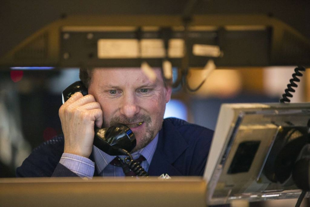 Stocks on Wall Street also gained more than 1 per cent, though the Nasdaq Composite initially lagged after briefly trading in the red. — Reuters pic