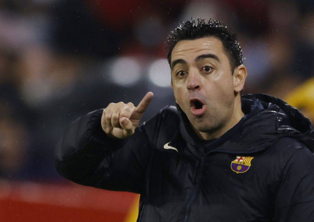 FC Barcelona coach Xavi Hernandez reacts during the game against Sevilla at the Ramon Sanchez Pizjuan, Seville December 21, 2021. — Reuters pic