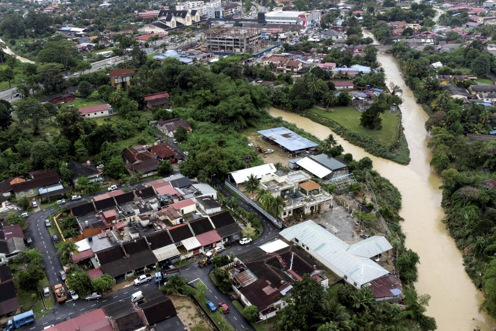 An aerial view of the area surrounding the river as well as Taman Lee Siew Joo and Kampung Blok C Ampangan in Seremban May 25, 2022. — Bernama pic