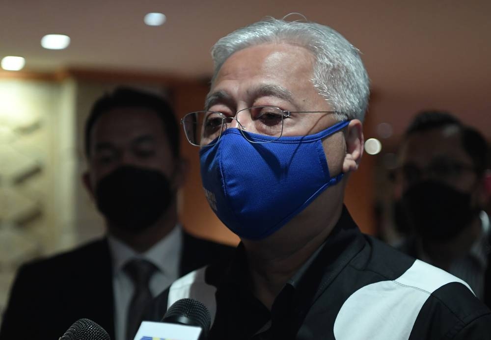 Prime Minister Datuk Seri Ismail Sabri Yaakob speaks to reporters after meeting with Singapore Prime Minister Lee Hsien Loong in Tokyo May 25, 2022. — Bernama pic