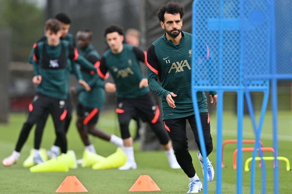 Liverpool midfielder Mohamed Salah runs during a training session at their training ground in Liverpool, north-west England, on May 25, 2022, ahead of their Uefa Champions League final football match against Real Madrid on May 28. — AFP pic 