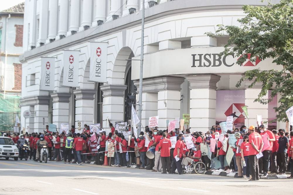 National Union of Bank Employees (Nube) members staged a picket in front of HSCB office in Ipoh May 26, 2022. — Picture by Farhan Najib