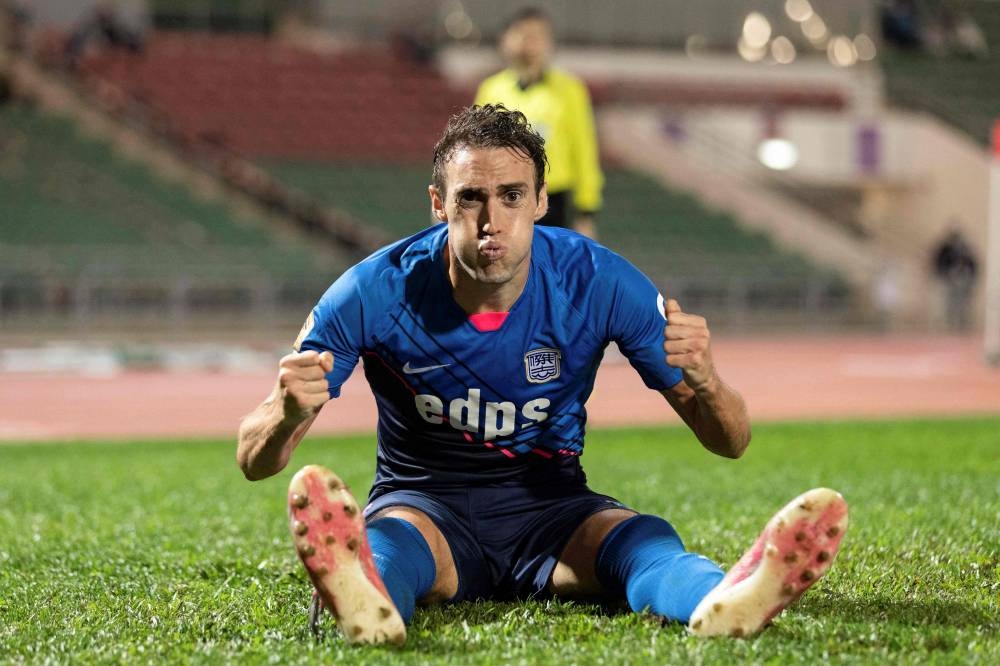 Kitchee's Raul Baena celebrates after scoring a goal against KC Southern during their football match in Hong Kong May 25, 2022. — AFP pic