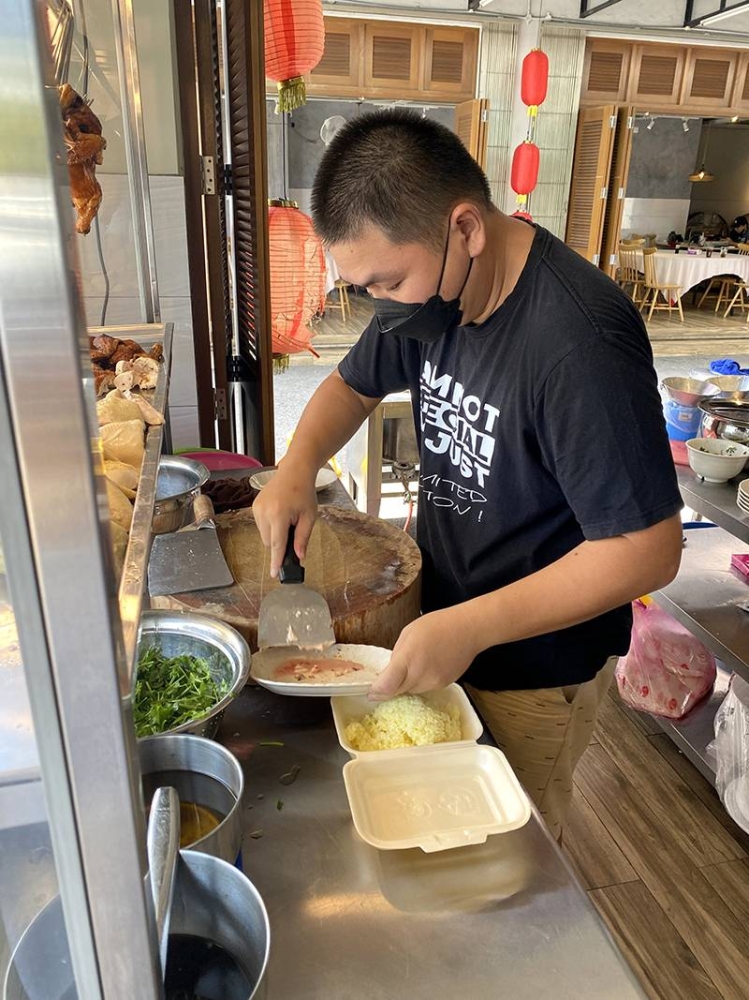 Lim Chee Hong started the chicken rice stall here in April this year