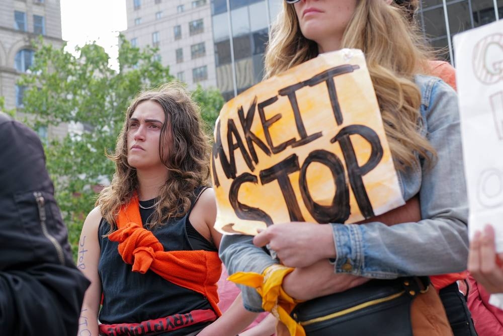 Gun rights activists, including the group Youth Over Guns, participate in a rally in Foley Square to demand an end to gun violence on May 26, 2022 in New York City. — Alexi Rosenfeld/Getty Images/AFP pic