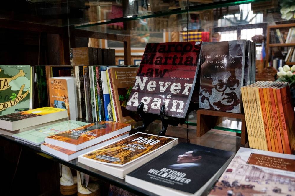 A book on martial law under the late dictator Ferdinand Marcos is displayed at a bookstore in Manila, Philippines May 19, 2022. — Reuters pic