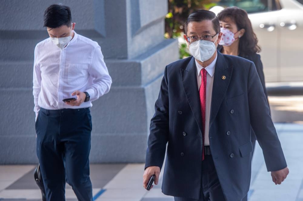 Lim Guan Eng arrives at the Kuala Lumpur High Court March 24, 2022. ― Picture by Shafwan Zaidon