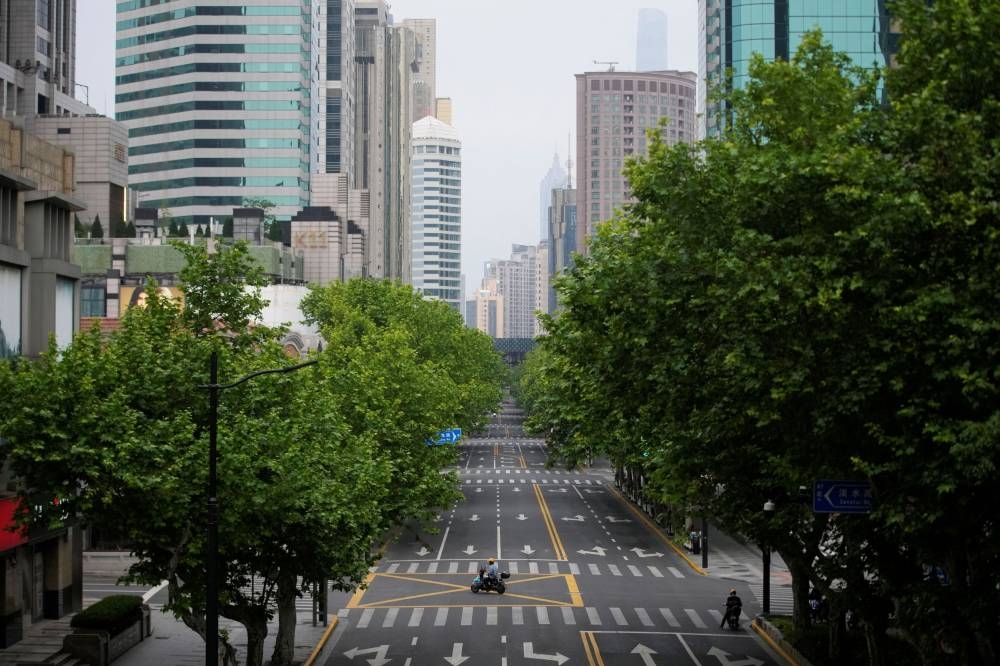 An empty street is pictured during lockdown, amid the coronavirus disease (Covid-19) pandemic, in Shanghai May 26, 2022. — Reuters pic