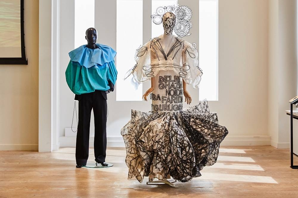 Sustainable silhouettes by BOTTER (left) and Nitin Bal Chauhan X Graviky Labs (right) on show at the Fashion for Good Museum in Amsterdam. ― Picture by Kyla Elaine via ETX Studio