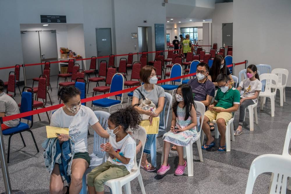 According to the CovidNOW website, a total of 1,701,913 of the children, or 48 per cent of the population, have received at least one dose of the vaccine. — Picture by Shafwan Zaidon