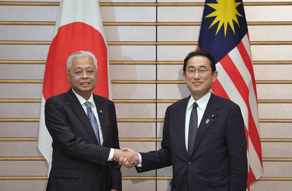 Prime Minister Datuk Seri Ismail Sabri Yaakob (left) meeting with the Prime Minister of Japan, Fumio Kishida at the Japanese Prime Minister’s Office May 27, 2022. — Bernama pic