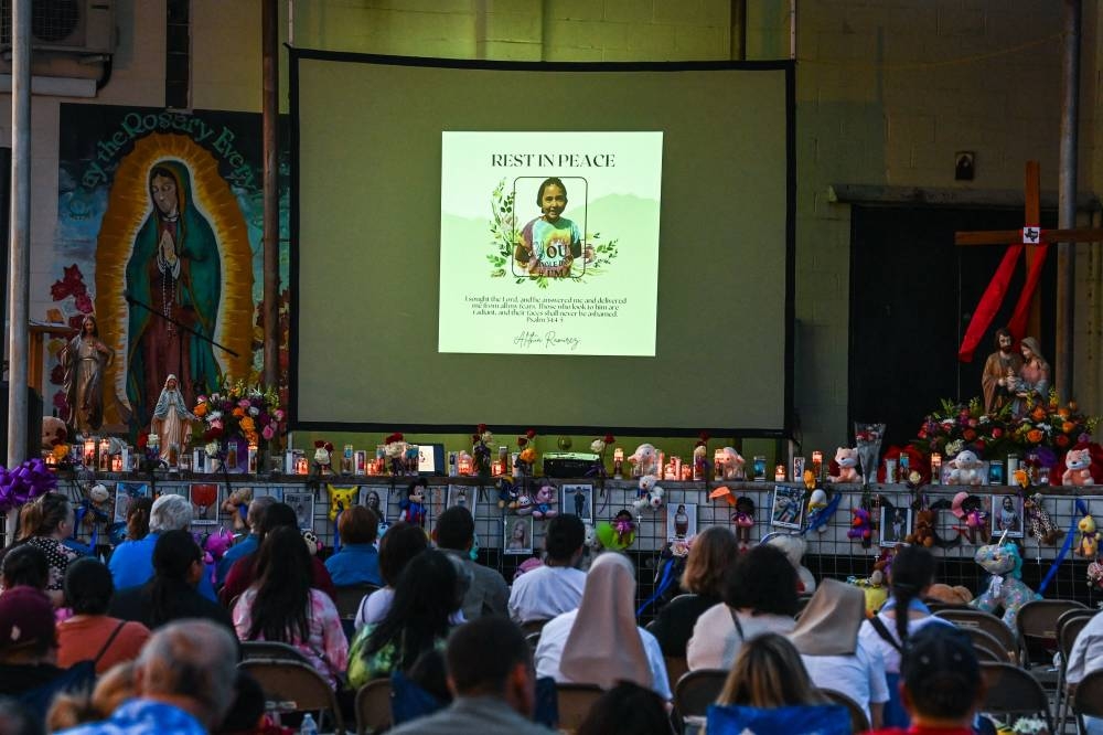 A photo of Alithia Ramirez, who died in the mass shooting, during a special prayer service for the shooting victims at Sacred Heart Catholic Church in Uvalde, Texas, on May 28, 2022. — AFP pic