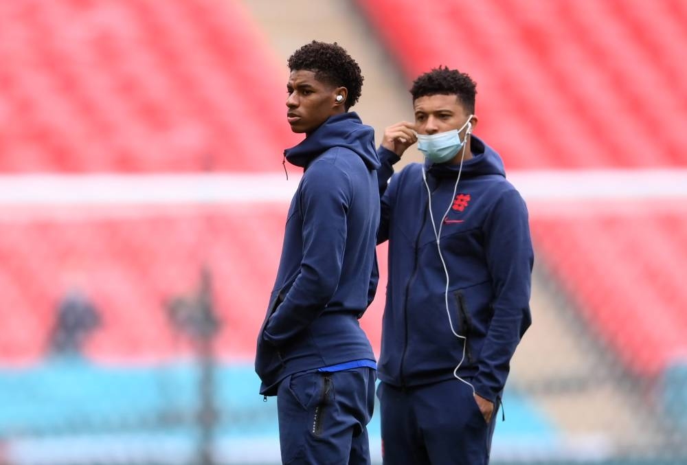 England's Marcus Rashford with Jadon Sancho on the pitch before the match against the Czech Republic at Wembley, London June 22, 2021. — Reuters pic