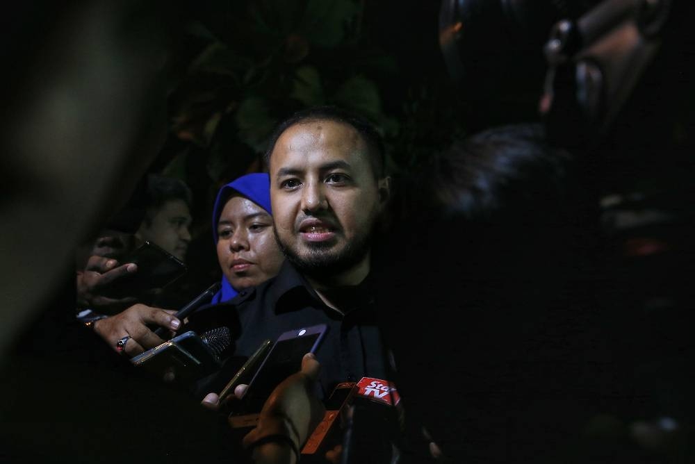 Farhash Wafa Salvador Rizal Mubarak speaks to media as he leaves Anwar Ibrahim's house in Segambut in this file picture taken on February 23, 2020. — Picture by Ahmad Zamzahuri