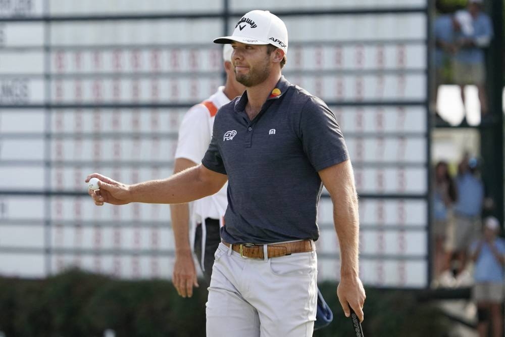 Sam Burns reacts after sinking his birdie putt during the final round of the Charles Schwab Challenge golf tournament in Texas May 29, 2022. — Reuters pic