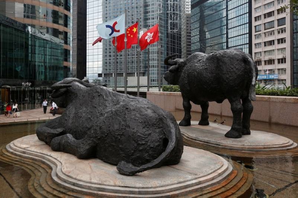 Hong Kong put on more than two per cent after a strong Friday performance fuelled by a rally in tech firms, while Tokyo, Sydney, Shanghai, Seoul, Taipei, Manila and Wellington were also well up. — Reuters pic