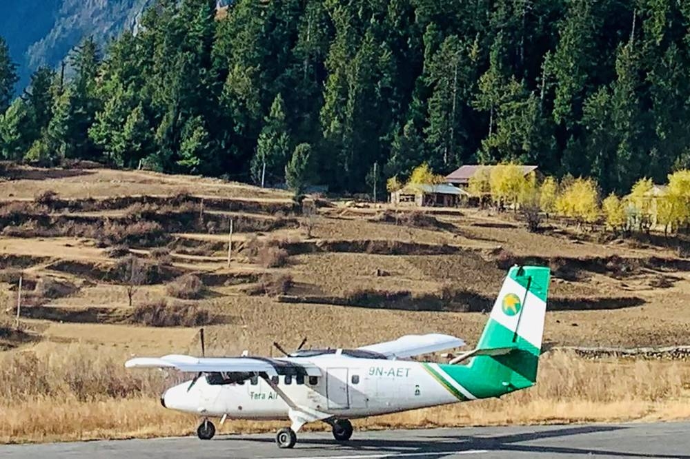 Handout image shows Tara Air's DHC-6 Twin Otter, tail number 9N-AET, in Simikot, Nepal December 1, 2021. Picture taken December 1, 2021. — Picture by Madhu Thapa/Handout via Reuters