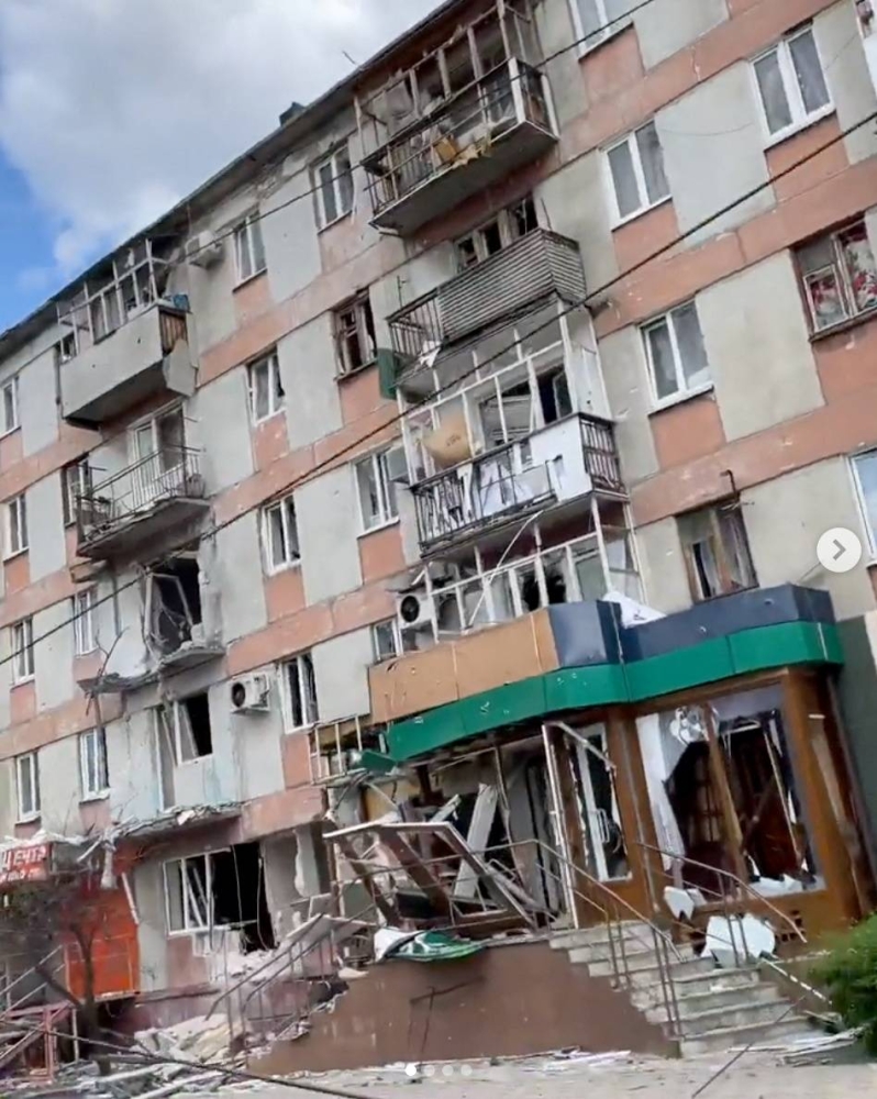 A view of a destroyed building following a shelling, amid Russia's invasion of Ukraine, in Sievierodonetsk, Luhansk region, Ukraine May 22, 2022. — Screen Capture of video obtained by Reuters