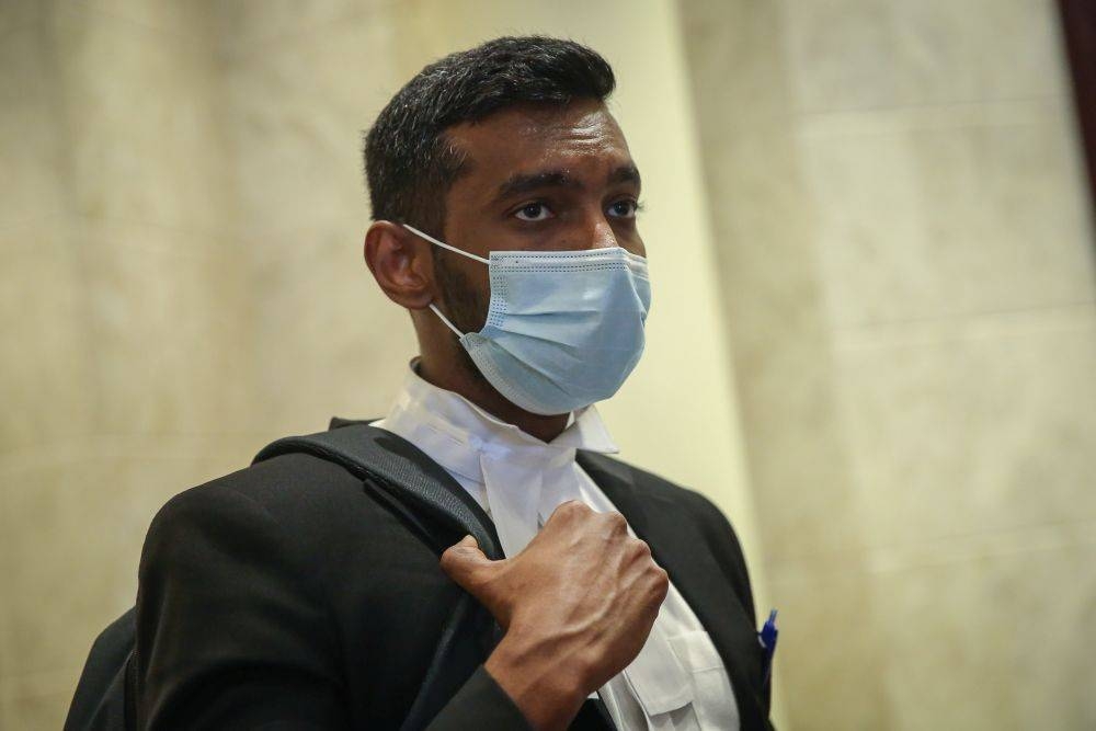 Lawyer Surendra Ananth speaks to reporters at the Federal Court in Putrajaya December 14, 2020. — Picture by Yusof Mat Isa