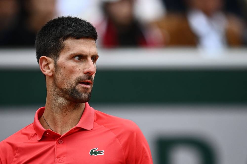 Serbia’s Novak Djokovic reacts as he plays against Argentina’s Diego Schwartzman during their men’s singles match on day eight of the Roland-Garros Open tennis tournament at the Court Suzanne-Lenglen in Paris May 29, 2022. — AFP pic 