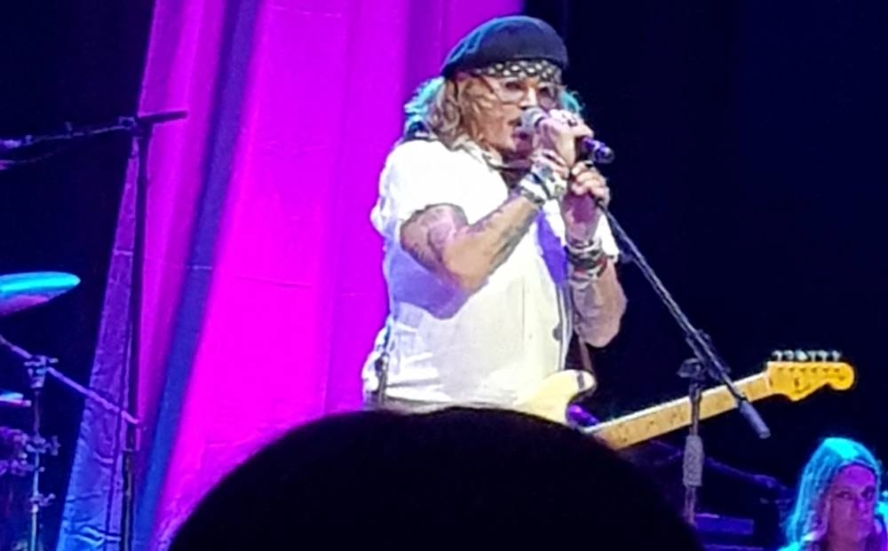 Actor Johnny Depp joins musician Jeff Beck (not pictured) on stage during a concert, in Sheffield, Britain May 29, 2022 in this picture obtained by Reuters from social media, May 30, 2022. — Picture from P Donovan via Reuters