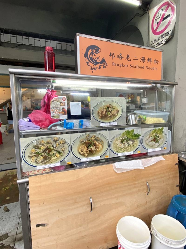 Look for Pangkor Seafood Noodle stall at Kedai Makanan & Minuman Alison in the busy Sri Petaling commercial area