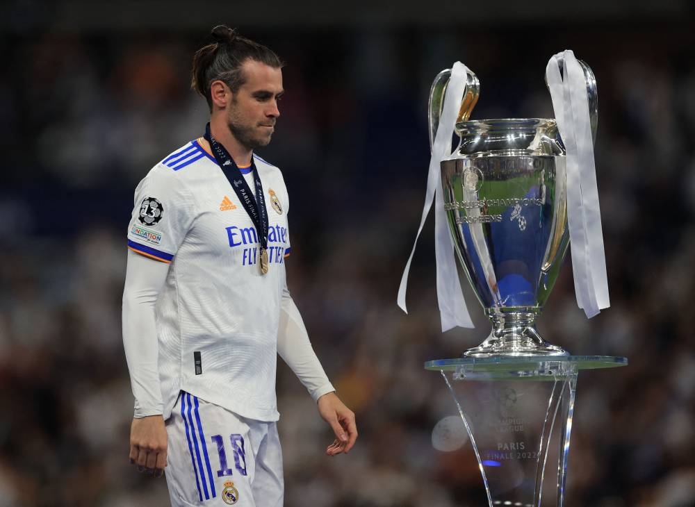 Real Madrid’s Gareth Bale walks past the trophy after winning the Champions League at the Stade de France, Saint-Denis near Paris, May 28, 2022. — Reuters pic 