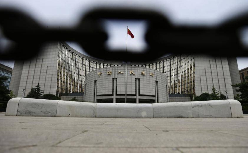 The headquarters of China'ss central bank, the People's Bank of China, is pictured behind an iron chain in Beijing, in this June 21, 2013 file picture. — Reuters pic