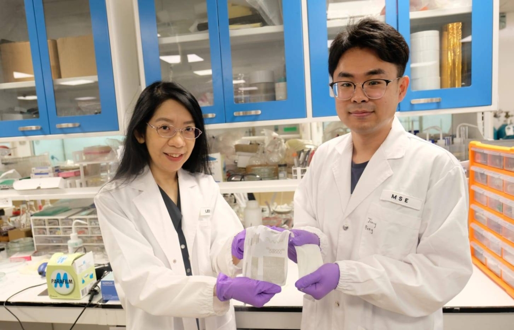 Professor Lee Pooi See and doctorate student Jiang Feng from Nanyang Technological University showing samples of the material their team developed. — Nanyang Technological University pic via TODAY