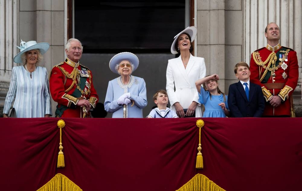 File photo of the Queen along with members of the Royal Family watching the special flypast by Britain’s RAF (Royal Air Force) from Buckingham Palace balcony following the Trooping the Colour parade, as a part of her platinum jubilee celebrations, in London, Britain June 2, 2022. ― Reuters pic