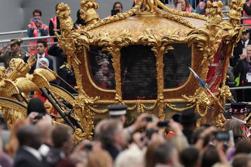 A hologram of Britain's Queen Elizabeth during her coronation in the Gold State Coach during the Platinum Jubilee Pageant in front of Buckingham Palace, London June 5, 2022. — Aaron Chown/Pool via  via Reuters     