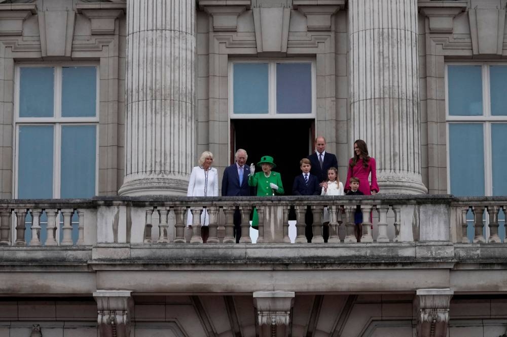 Britain's Camilla, Duchess of Cornwall, Prince Charles, Queen Elizabeth, Prince George, Prince William, Princess Charlotte, Prince Louis and Catherine, Duchess of Cambridge stand on the balcony during the Platinum Pageant, marking the end of the celebrations for the Platinum Jubilee of Britain's Queen Elizabeth, in London June 5, 2022. — Frank Agustein/Pool via Reuters                