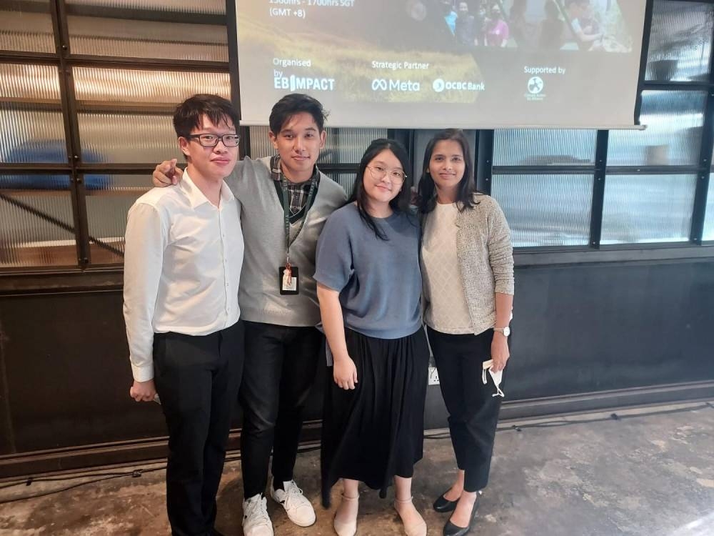 The Team ReuseOnly members (from left) Cheong Yuan Rong, Mohamad Iyan Danial and Sherlyn Neo, with their mentor Abhiruchi Gadgil. Not pictured here is team member Ooi Zhi Yong. —  Picture courtesy of OCBC via TODAY