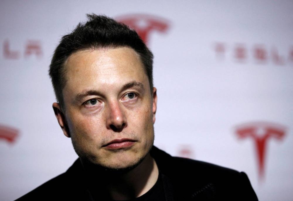Tesla Motors Inc CEO Elon Musk talks about Tesla's new battery swapping program in Hawthorne, California June 20, 2013. — Reuters pic