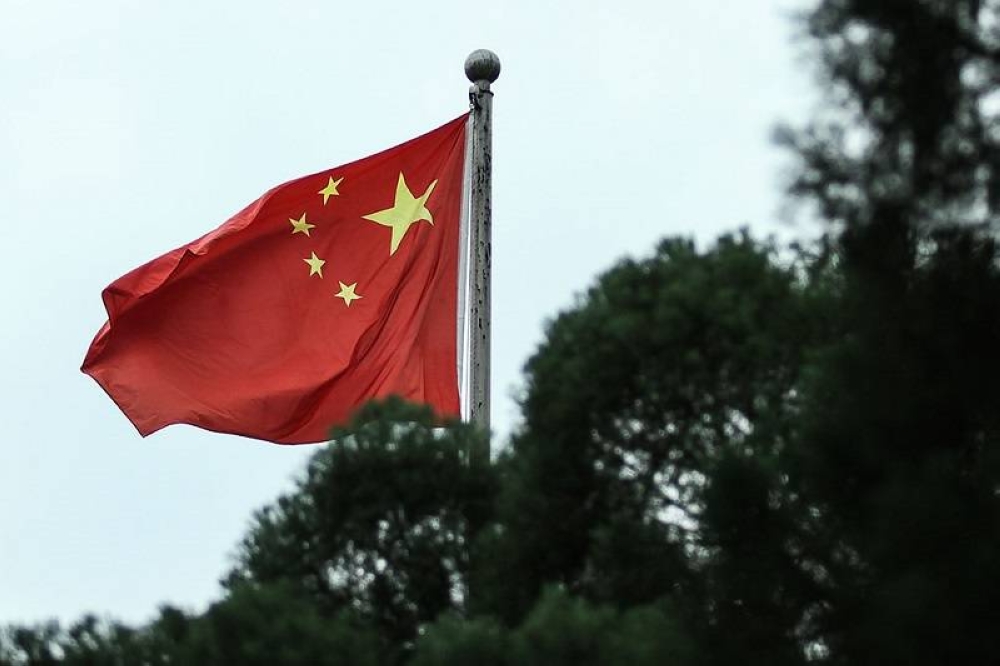 China’s national flag is seen outside the Embassy of The People’s Republic of China in Kuala Lumpur January 26, 2018. — Picture by Miera Zulyana