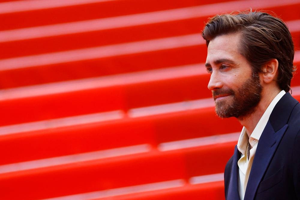 Jake Gyllenhaal poses on the red carpet at the 75th Cannes Film Festival, France, May 24, 2022. — Reuters pic 