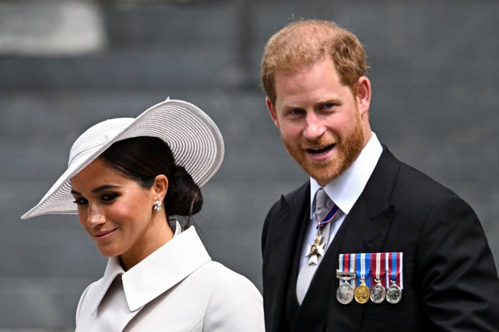 Britain's Prince Harry and his wife Meghan, Duchess of Sussex, leave after the National Service of Thanksgiving held at St Paul's Cathedral as part of celebrations marking the Platinum Jubilee of Britain's Queen Elizabeth, in London June 3, 2022. ― Reuters pic