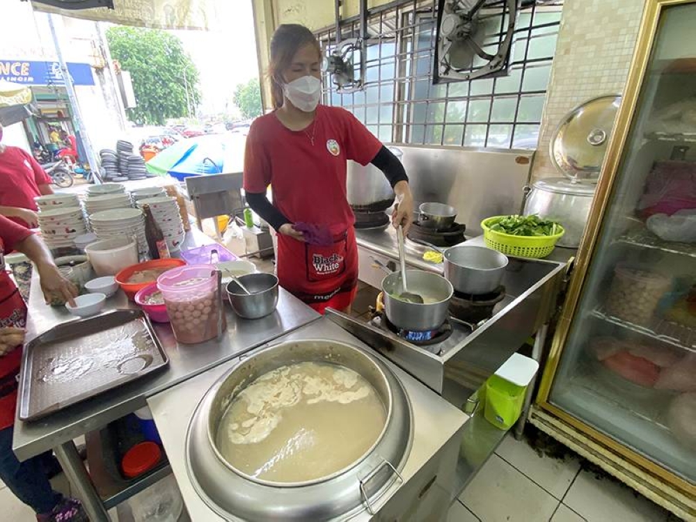 Each bowl of pork noodles is cooked upon order using that rich pork broth