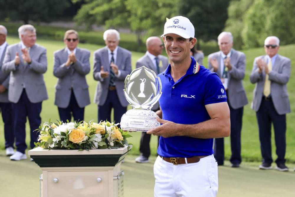 Billy Horschel poses for a photo as he holds the trophy after winning the Memorial Tournament in Dublin June 5, 2022. ― Aaron Doster-USA TODAY Sports via Reuters