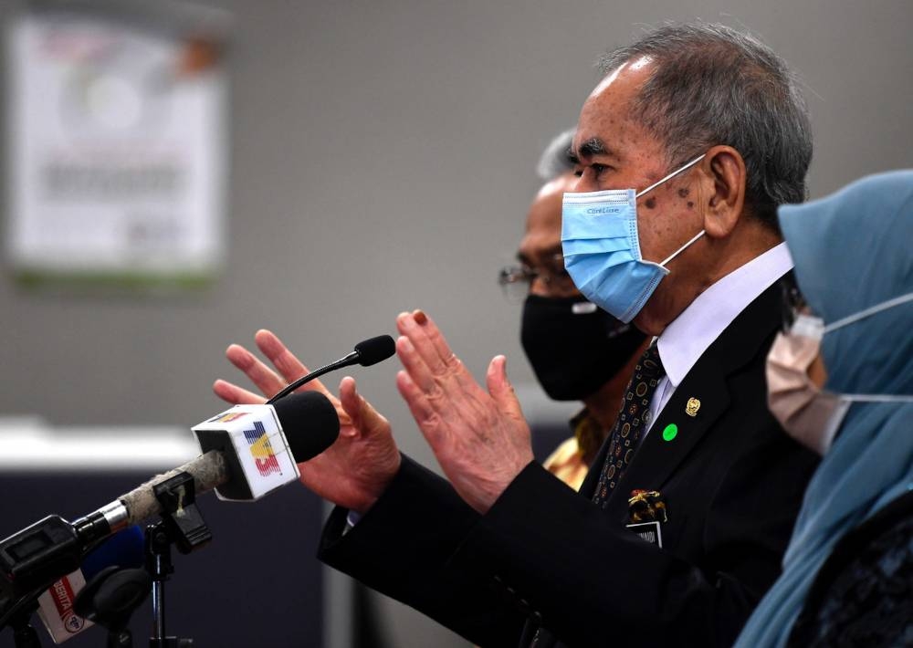 Datuk Seri Wan Junaidi Tuanku Jaafar speaks to the media in Parliament in this file picture taken on December 23, 2021. — Bernama pic