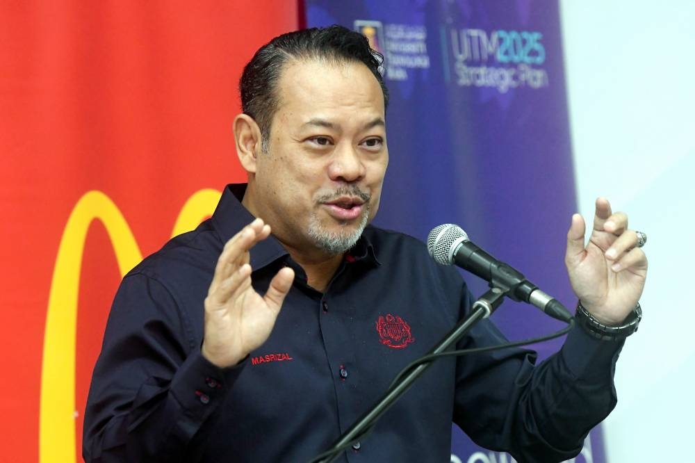 Deputy Minister Datuk  Ahmad Masrizal Muhammad speaks at the Apprentice Programme launching ceremony and the signing of a Memorandum of Understanding (MoU) between Universiti Teknologi Mara (UiTM) and McDonald’s Malaysia in Shah Alam June 10, 2022. — Bernama pic