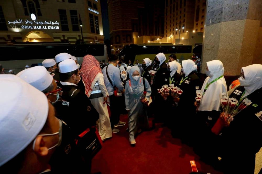 A total of 295 pilgrims who were among the first group arrived safely at the Prince Mohammad Abdulaziz International Airport at Madinah, June 5, 2022. — Bernama pic