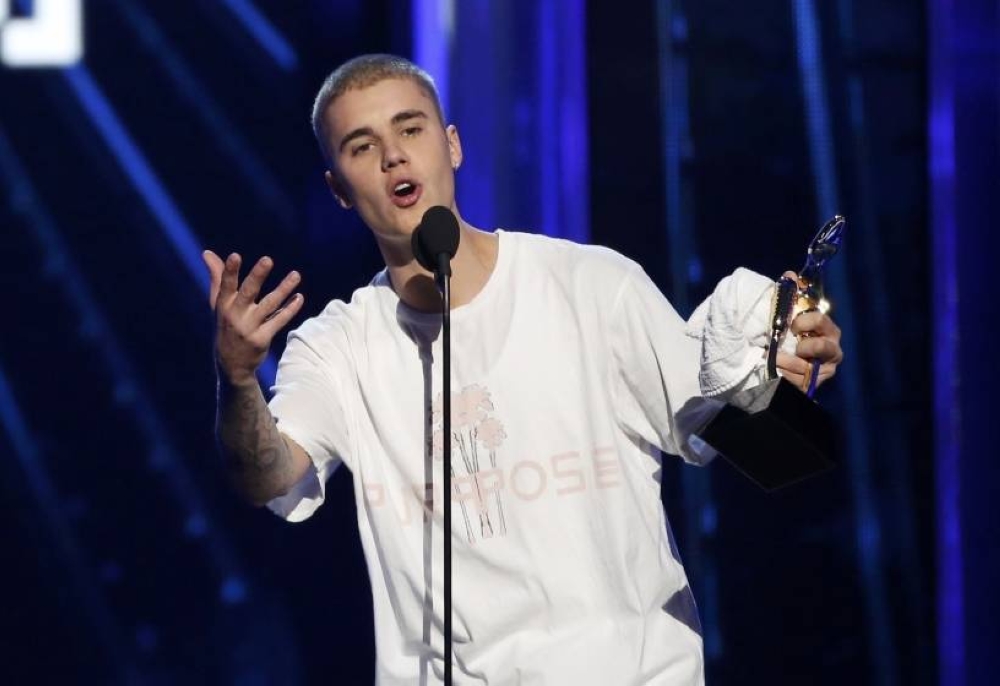 Bieber, 28, said he was physically unable to perform his upcoming shows but was doing facial exercises and expected to recover. — Reuters pic